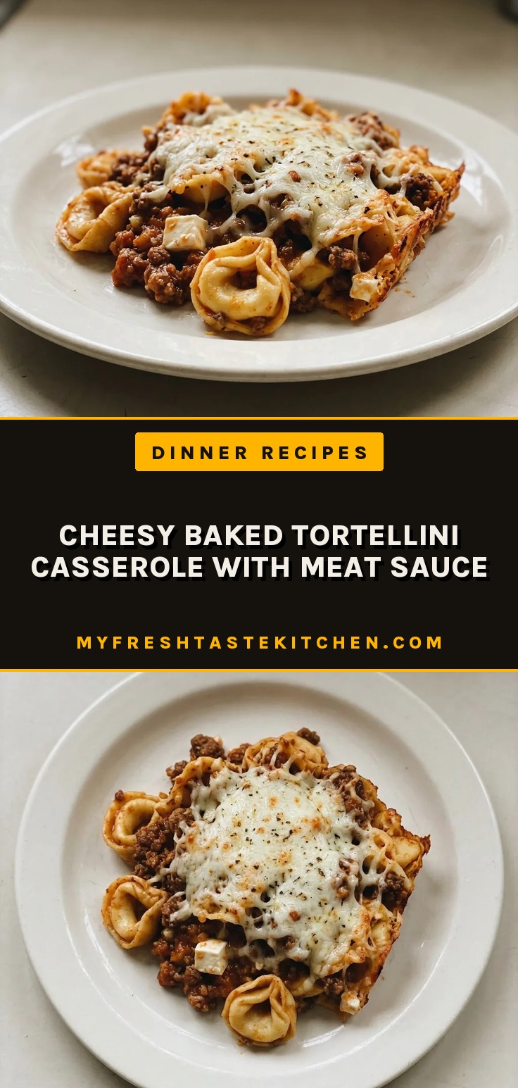 Bird's-eye view of a casserole dish filled with cheese tortellini and ground beef in red sauce, topped with melted mozzarella and Parmesan.