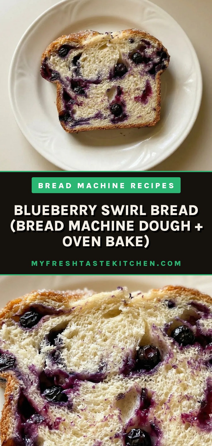 Looking down at a loaf of blueberry swirl bread with purple-blue berry ribbons visible in the golden crumb.