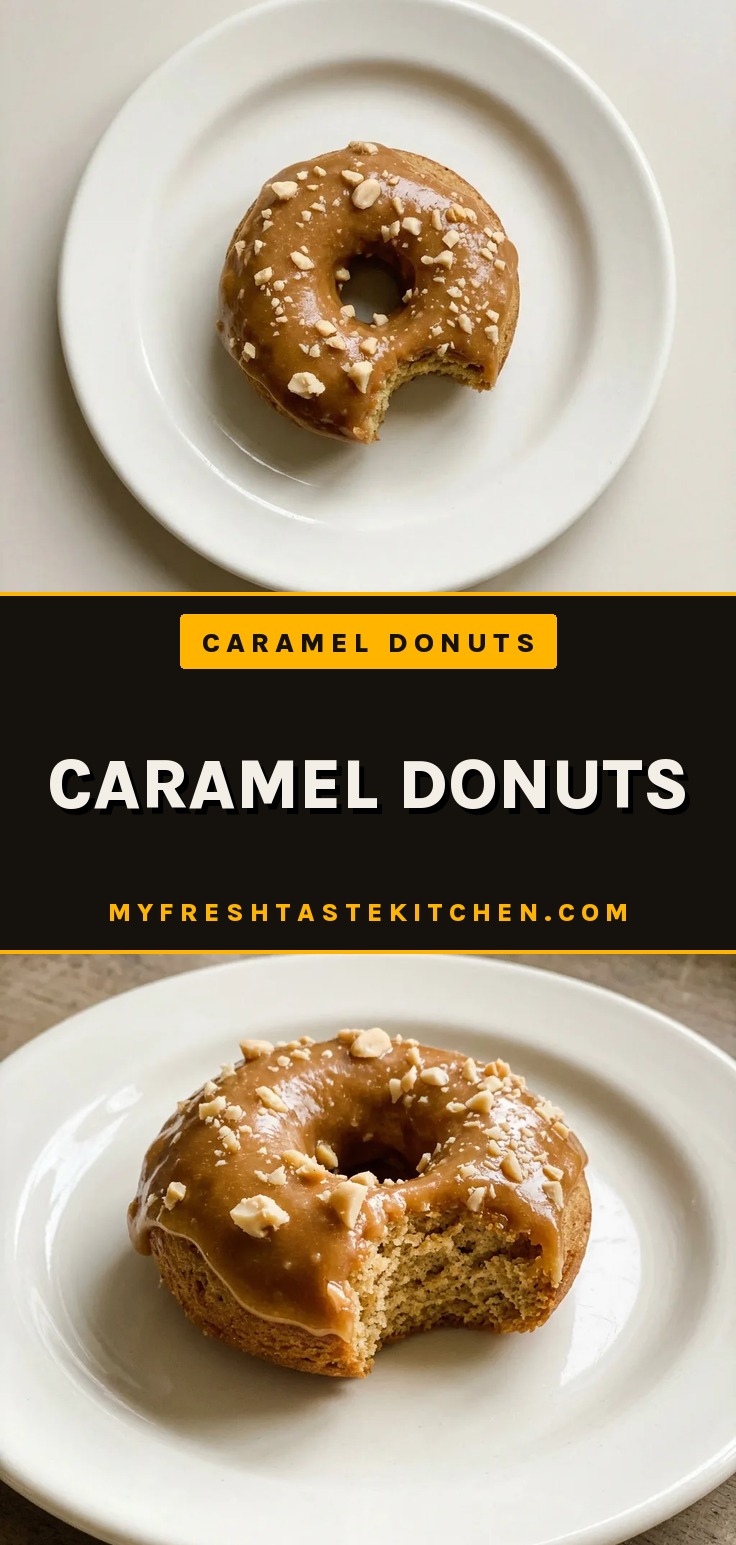 Baked caramel donuts with glossy caramel glaze and chopped peanuts on top, showing a soft golden crumb inside.