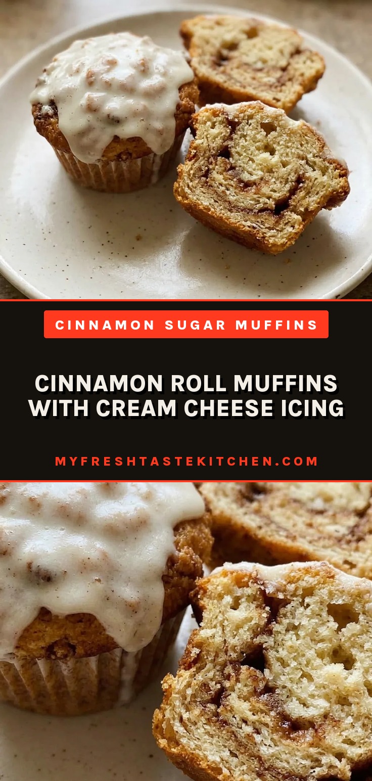 Looking down at four cinnamon roll muffins topped with white cream cheese icing and a sprinkle of cinnamon.