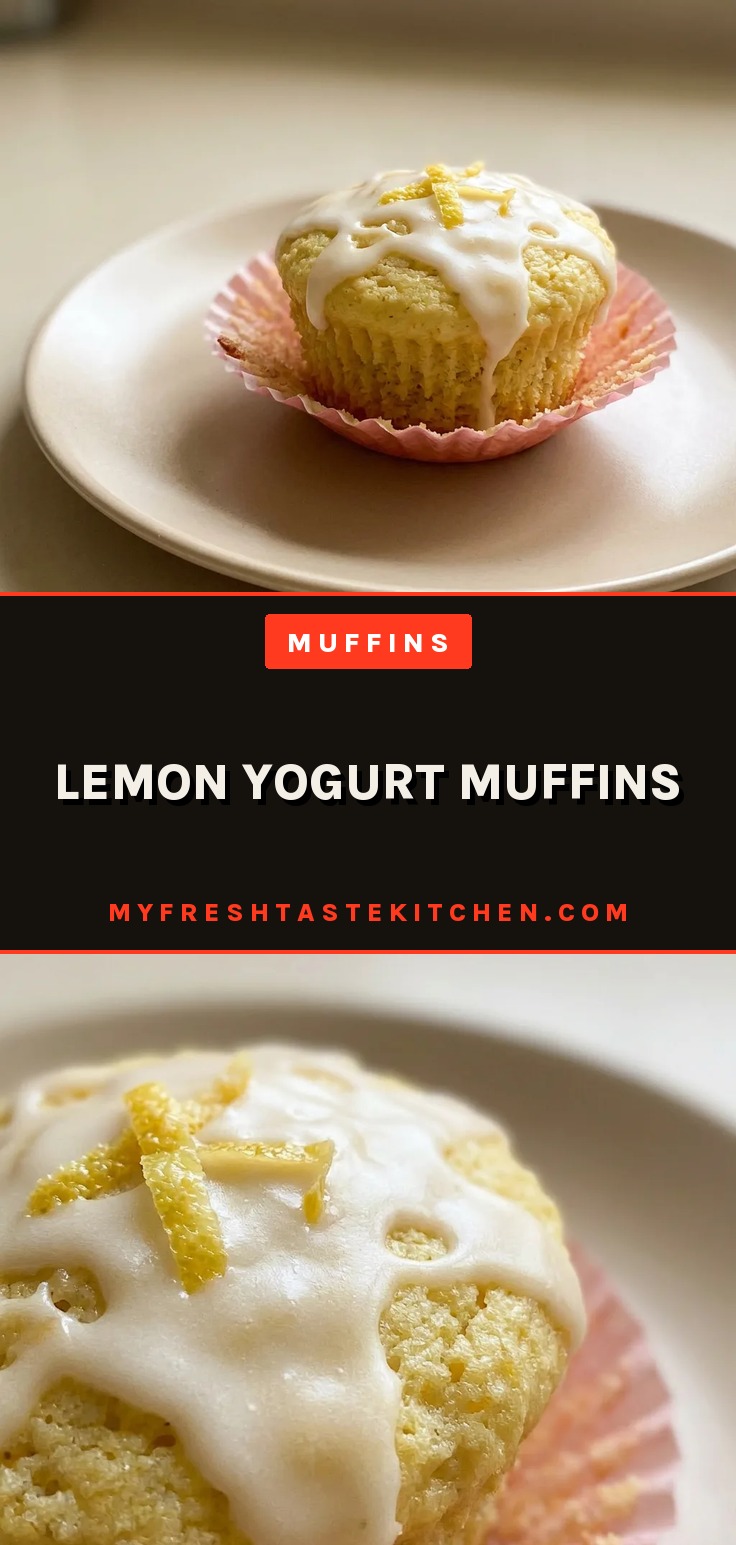 Top-down look at a lemon yogurt muffin with a visible swirl of yogurt and lemon zest on top.