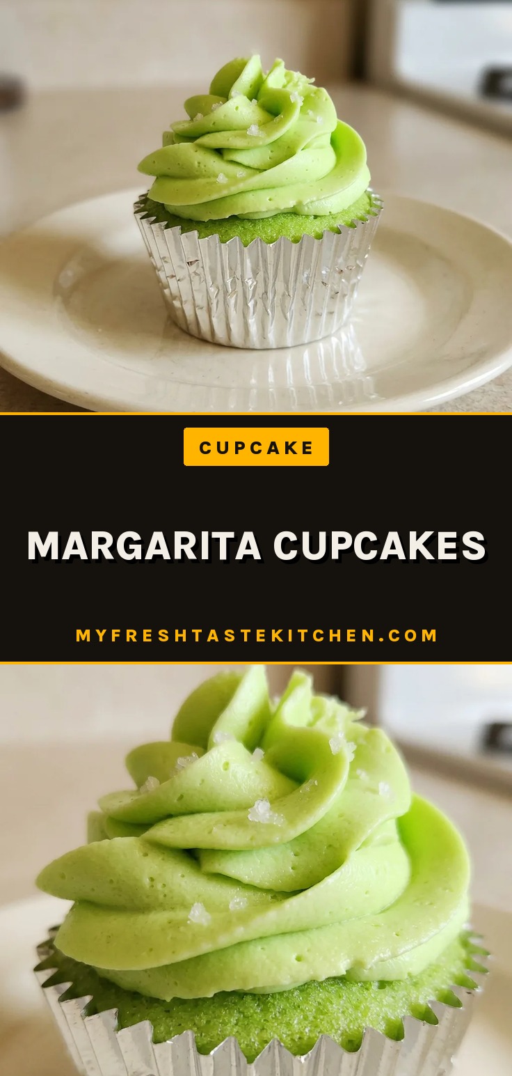 Looking down at three margarita cupcakes with lime jello glaze, topped with tequila-lime frosting and a lime wedge.