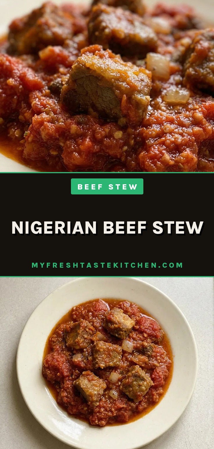 Nigerian beef stew with beef chunks in a thick red tomato and pepper sauce, garnished with oregano and thyme leaves.