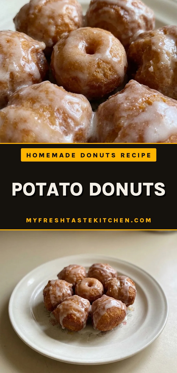 Golden fried donuts glazed with powdered sugar glaze, showing fluffy interior made from mashed potato doughnuts.