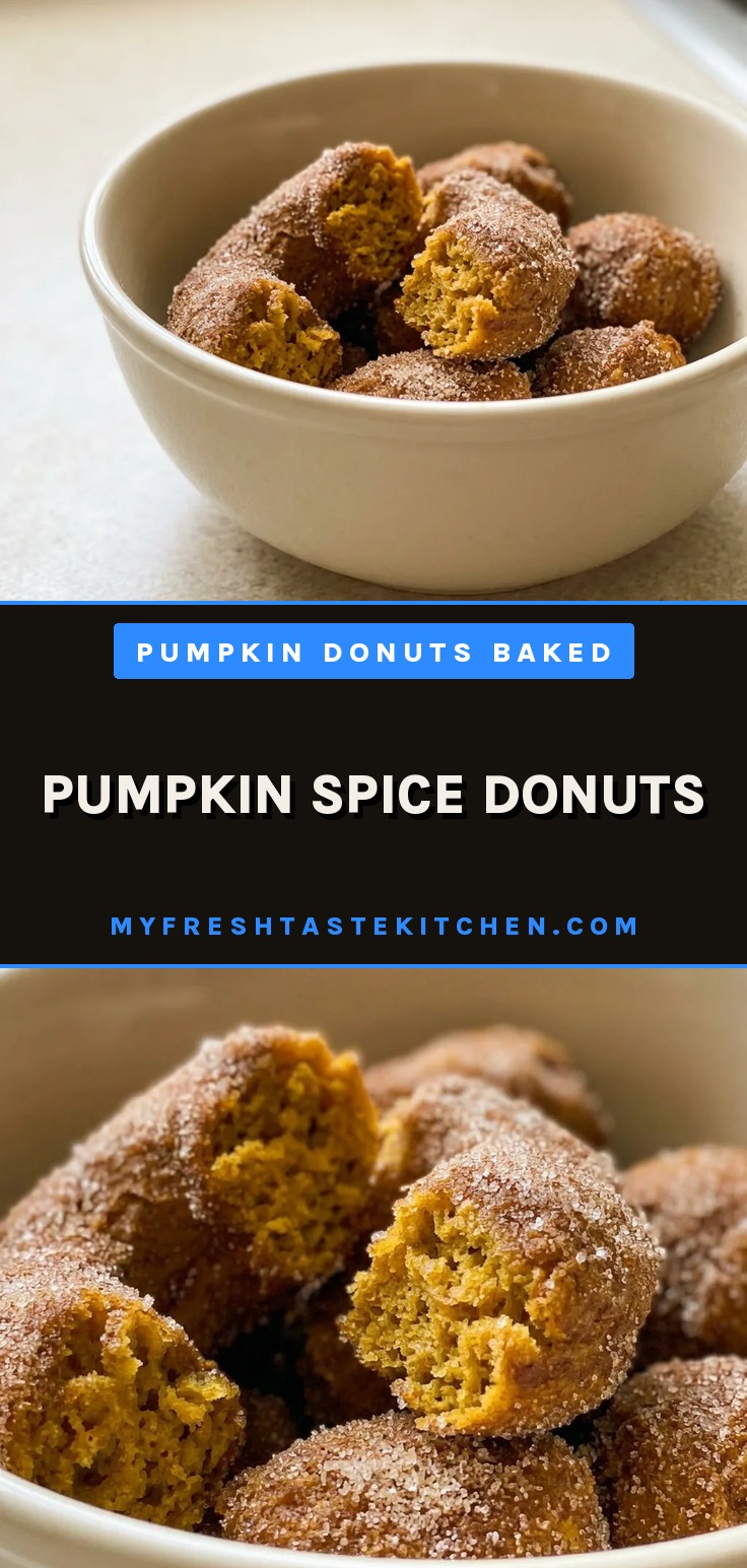 Pumpkin spice donuts coated in cinnamon sugar, showing a golden brown exterior with a soft interior.