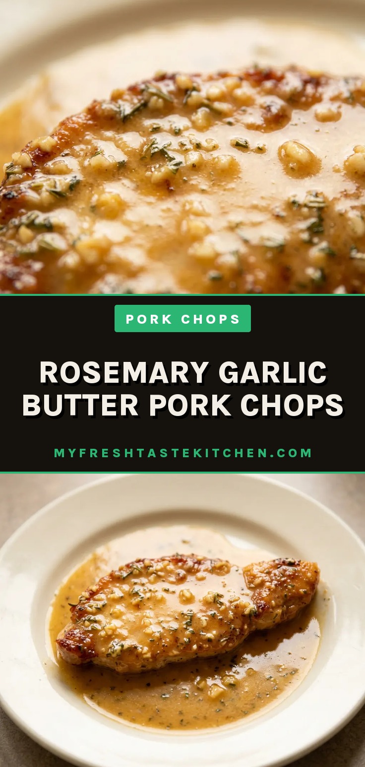 Bird's-eye view of two pork chops topped with rosemary sprigs, garlic cloves, and butter pats, with lemon slices on the side.