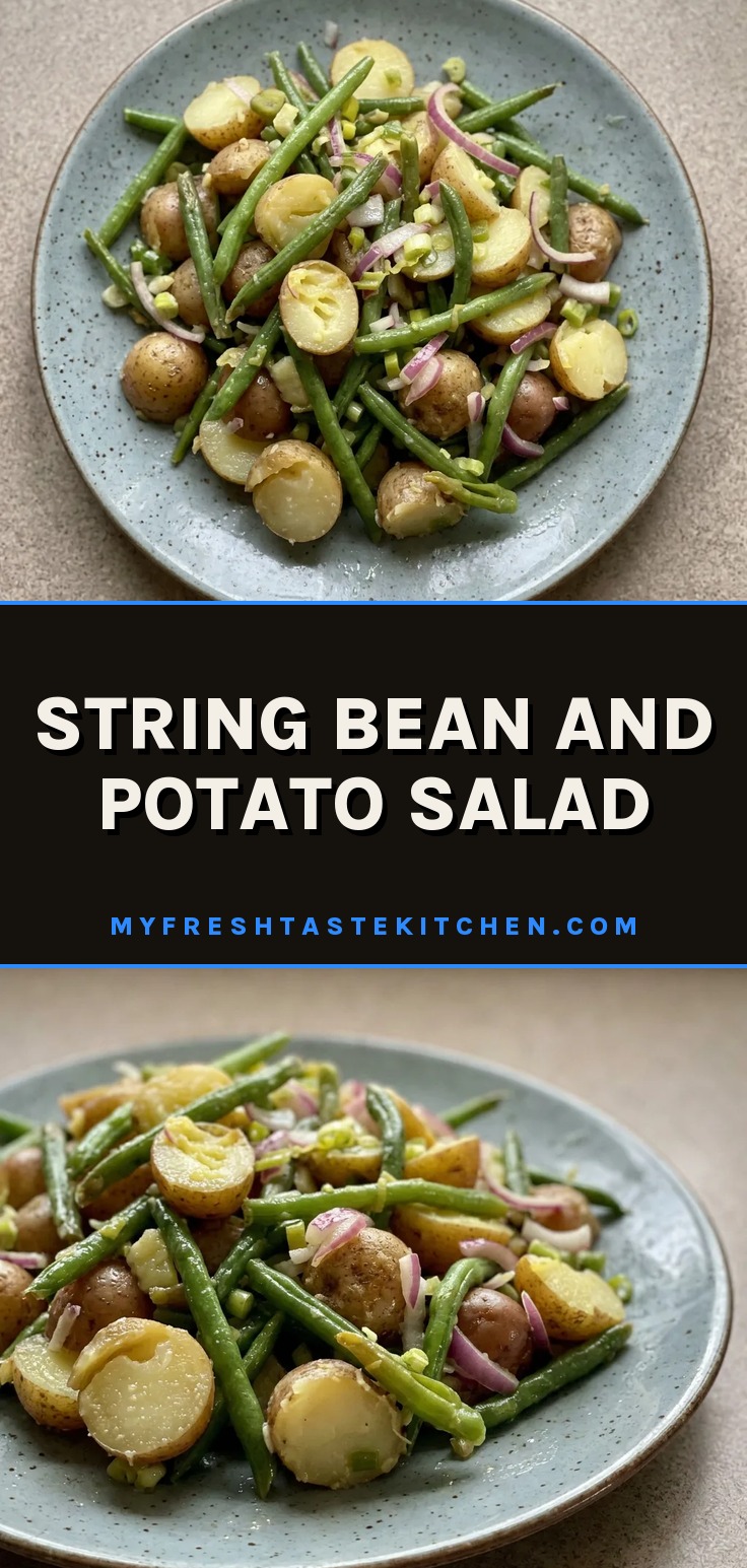 String bean and potato salad with string beans, potatoes, and red onion in a bowl.