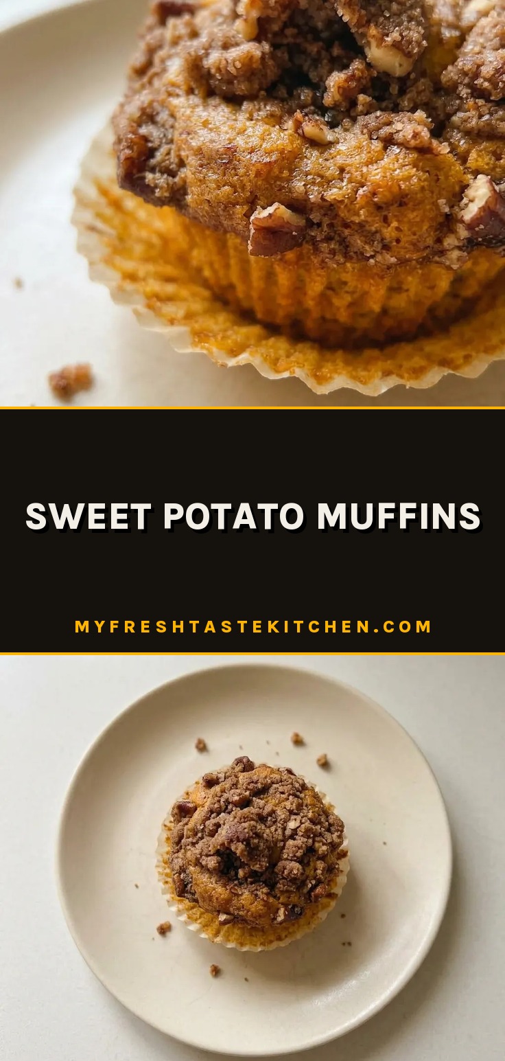 Overhead shot of a round muffin with a cracked top, speckled with cinnamon and nutmeg, topped with pecan halves.