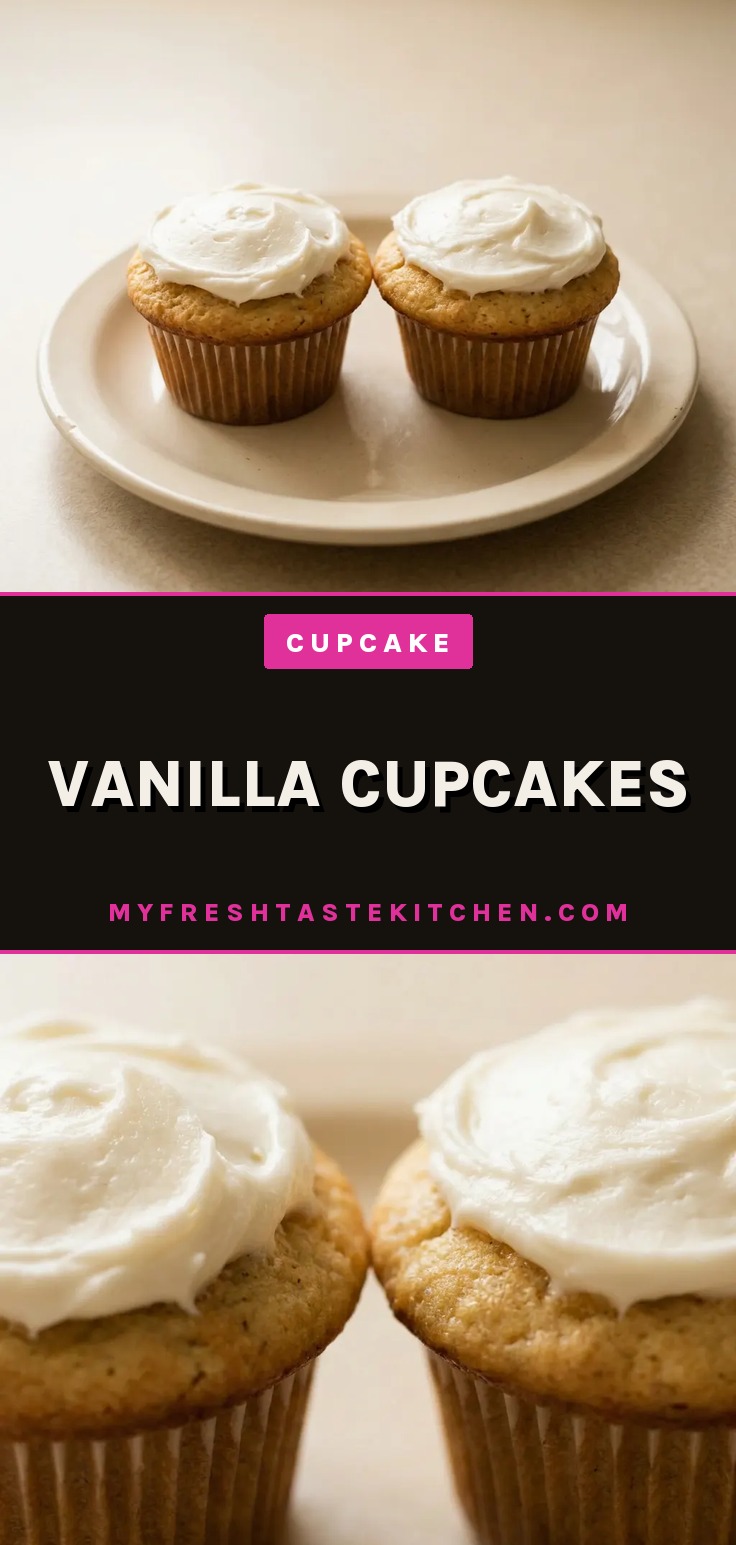 Overhead shot of three vanilla cupcakes with buttercream frosting and rainbow sprinkles on a white plate.