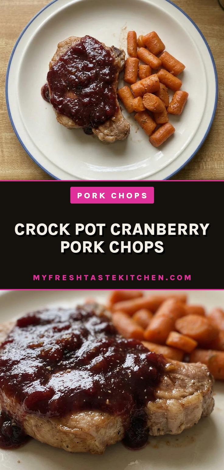 Overhead shot of two boneless pork chops topped with thick cranberry sauce, garnished with fresh cranberries and rosemary sprigs.