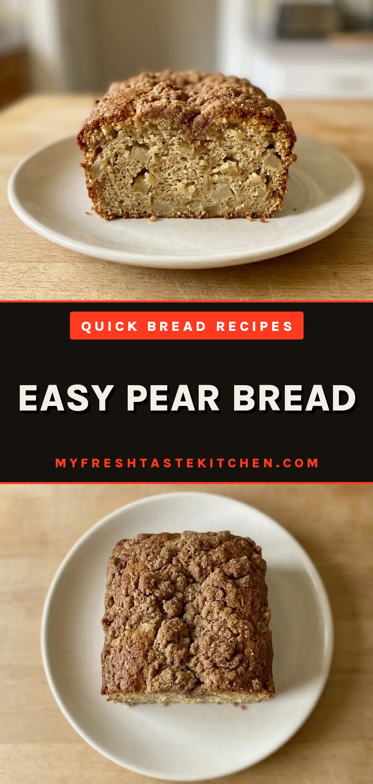 Looking down at a round slice of pear bread with visible pear chunks and a light dusting of cinnamon.