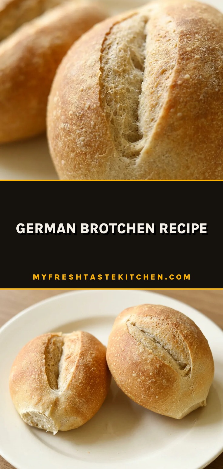 Overhead shot of two round bread rolls with a golden-brown crust and diagonal slashes, one topped with butter pats.