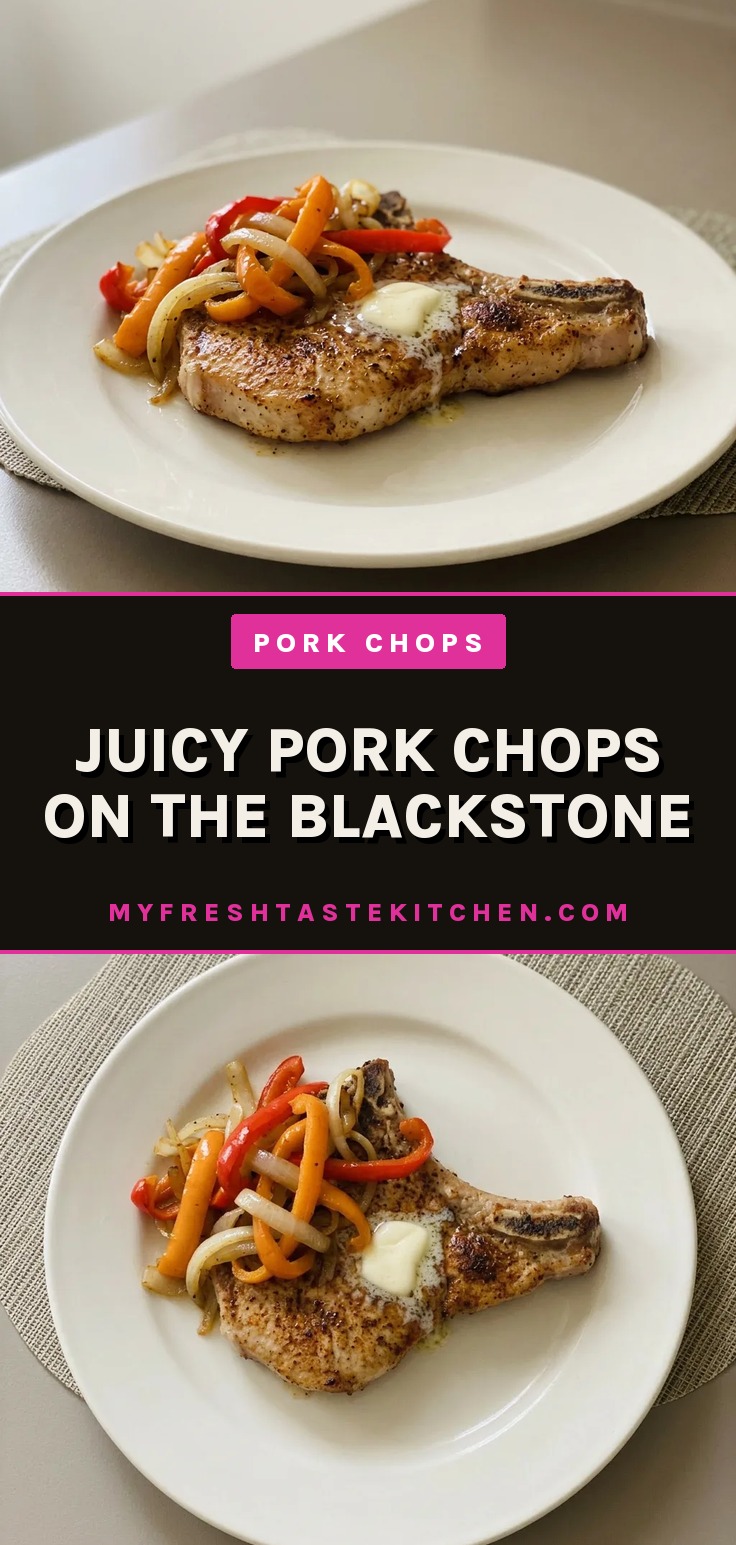 Looking down at two pork chops with BBQ rub, topped with butter and bell peppers, alongside beer-braised onions.