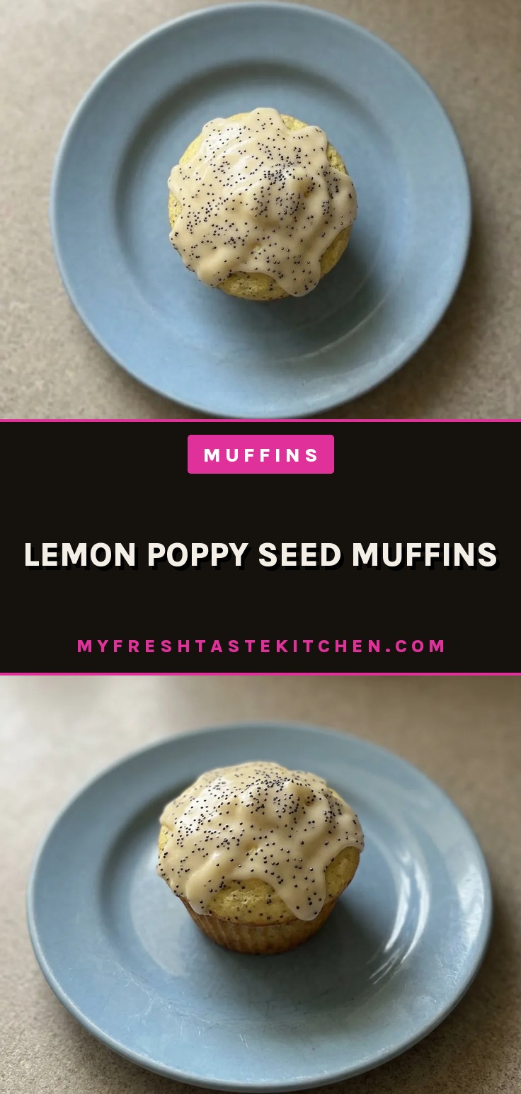 Overhead shot of a lemon poppy seed muffin topped with powdered sugar, showing a golden-brown dome with visible poppy seeds.