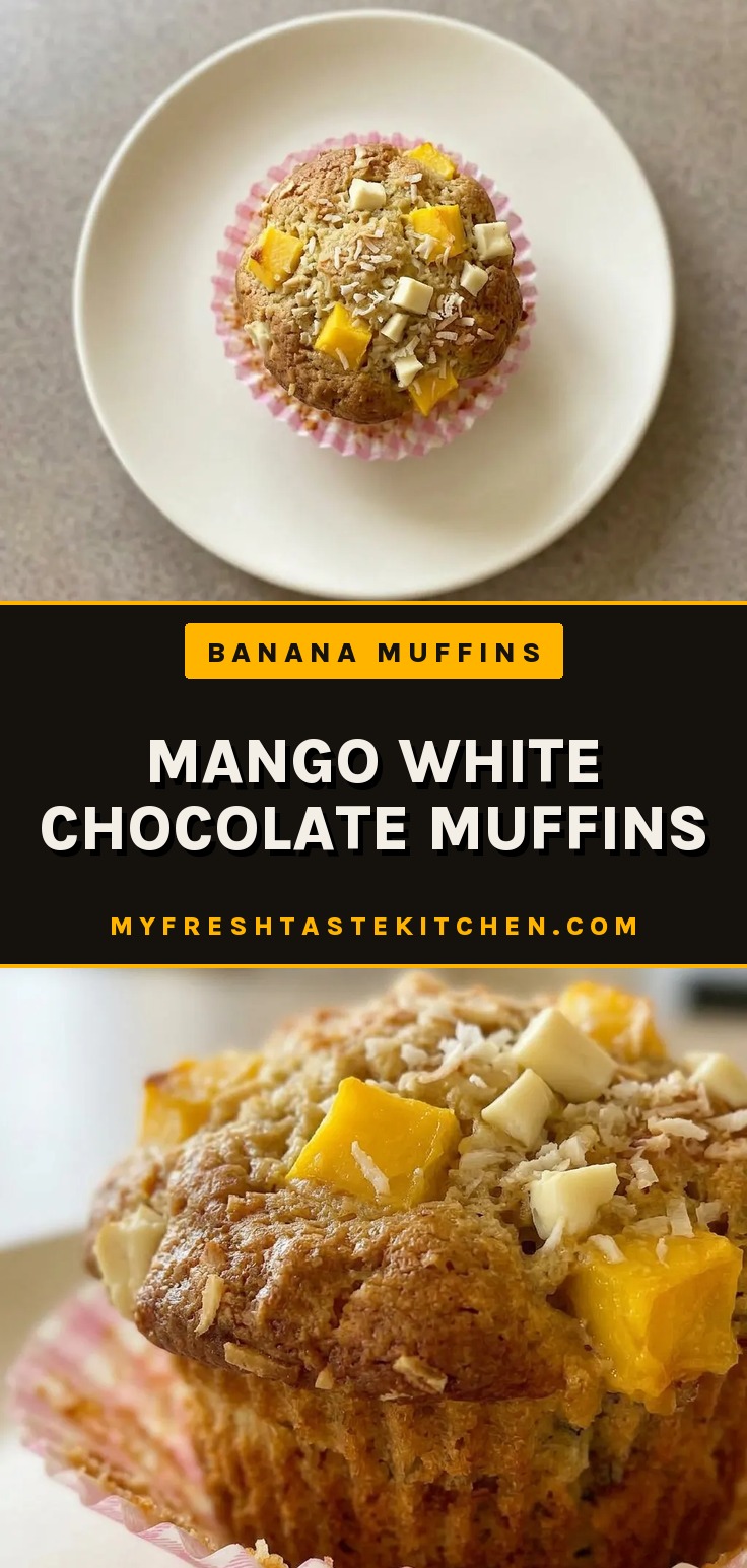 Bird's-eye view of a muffin with mango chunks, banana slices, coconut flakes, and white chocolate chips on top.