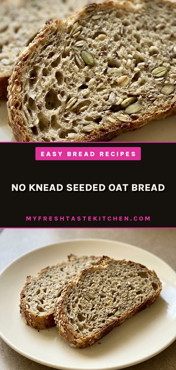Top-down look at a round seeded oat bread slice, showing oats, pumpkin seeds, sunflower seeds, and flax seeds scattered on the crust.