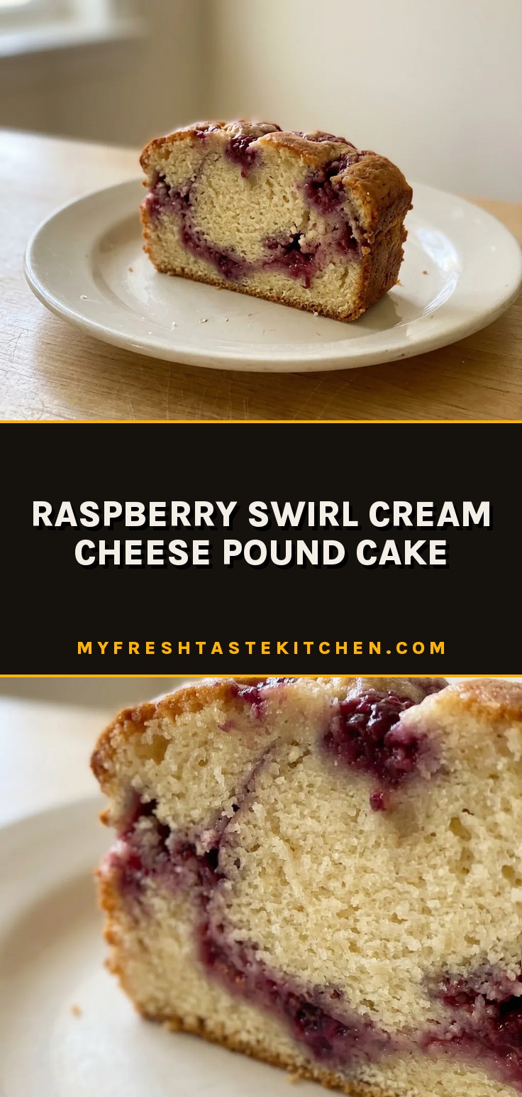 Bird's-eye view of a slice of raspberry swirl cream cheese pound cake on a white plate, with visible raspberry and cream cheese swirls.