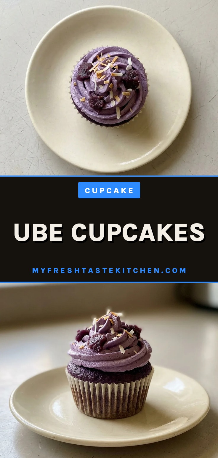 Bird's-eye view of three ube cupcakes with purple frosting, each topped with a dollop of ube jam and a small swirl of cream.