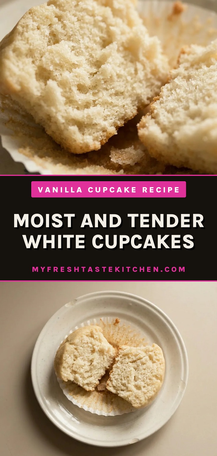 Looking down at three white cupcakes with swirls of vanilla frosting on a circular plate.