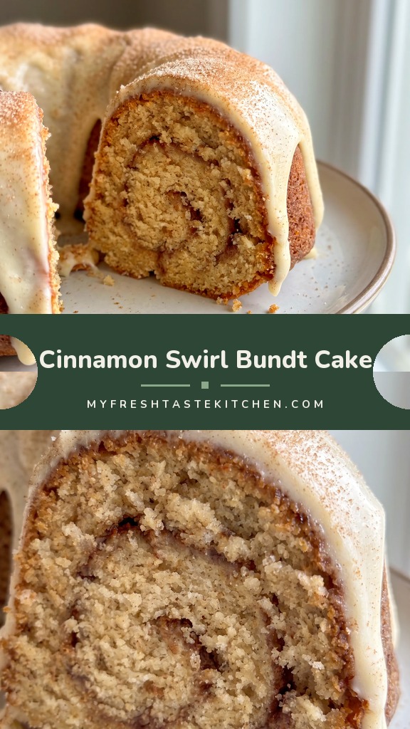 A Bundt cake with a cinnamon sugar crust, a cinnamon swirl through the crumb, and a cream cheese glaze piped in a zigzag.