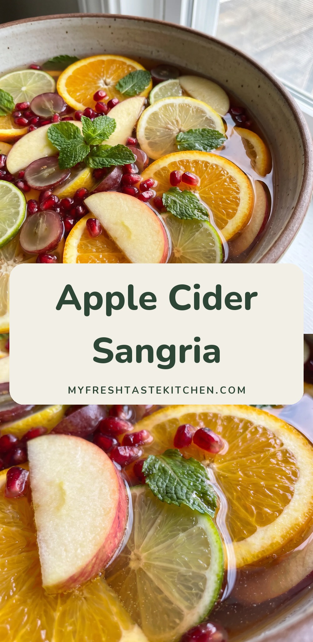 Bowl of sangria with orange, lemon and lime slices, apple wedges, pomegranate seeds and mint.